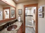 Mammoth West 135: Primary Bathroom with Separate Sink and Shower Areas